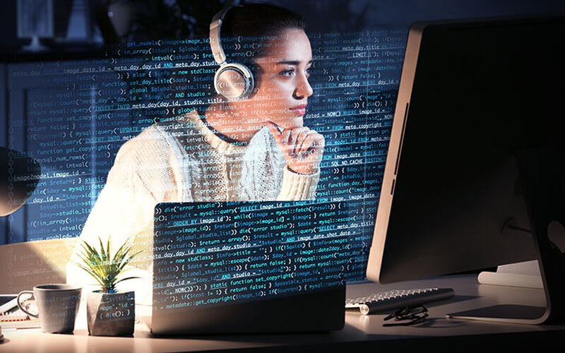 A lady in front of coding